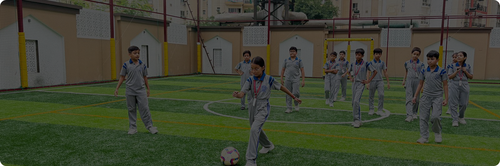 Students playing sports on SDHPS green turf grounds
